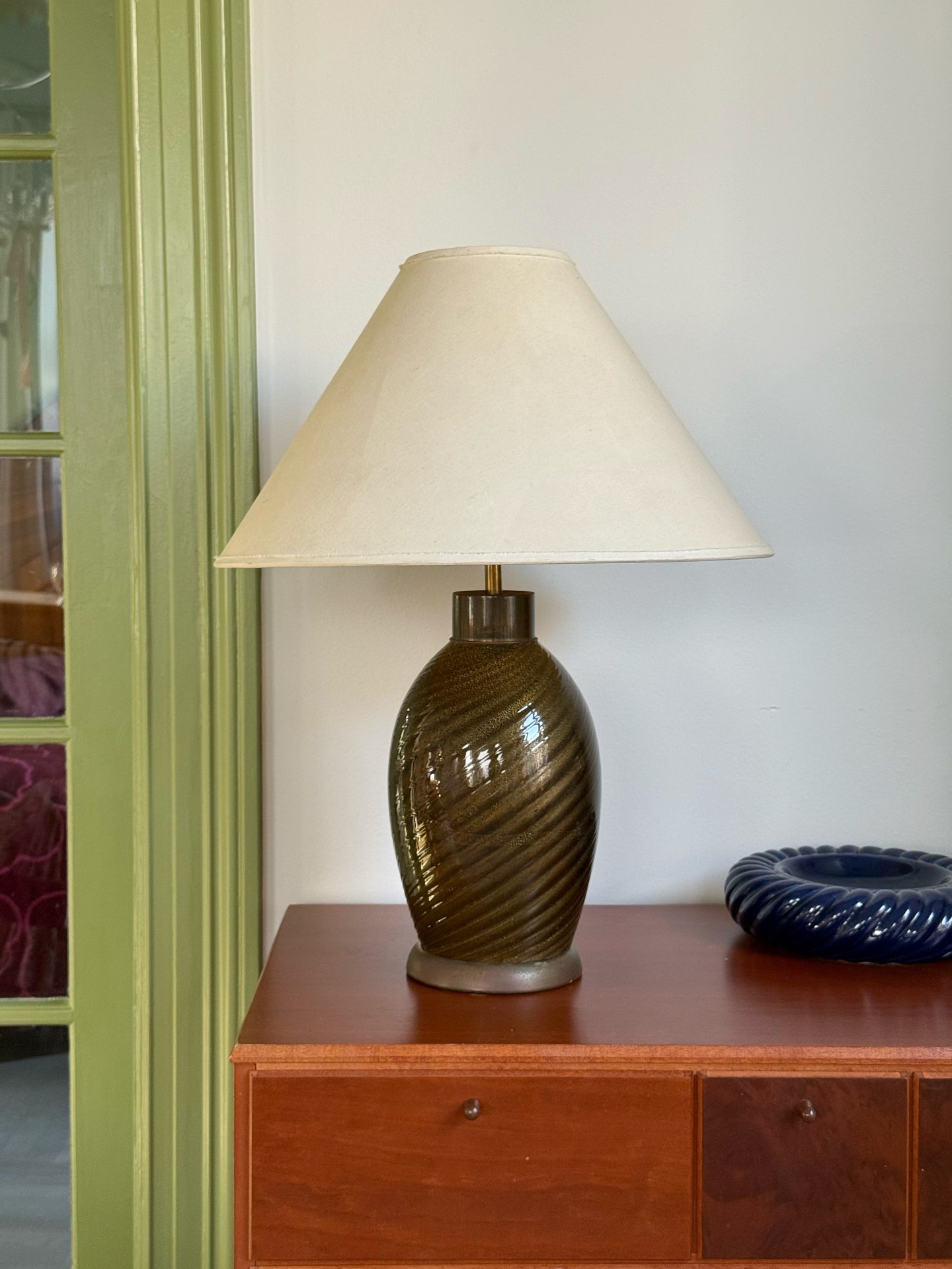 Vintage Italian swirled glass table lamp with gold inclusions and a cream shade